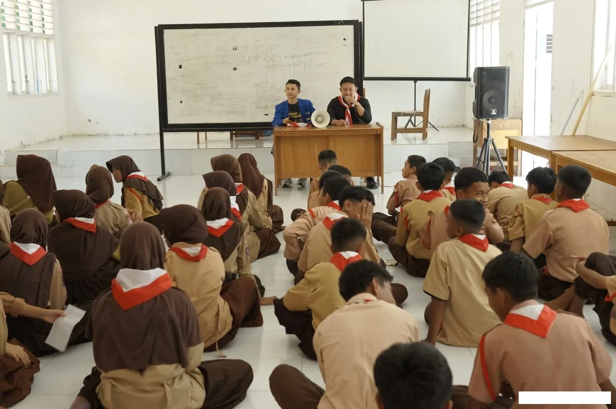 PMII Kota Gorontalo dan SMPN 2 Satap Bulango Ulu Gelar Peringatan Hari Pramuka dan HUT RI ke-80 di Mongiilo Utara